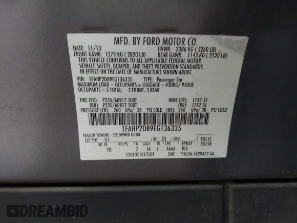 2014 Ford Taurus SE with VIN 1FAHP2D89EG136335, listed as a IAAI auction lot 41880655 with 211,635 mi miles. Bid and sale history available at carsss.com. Image 9.