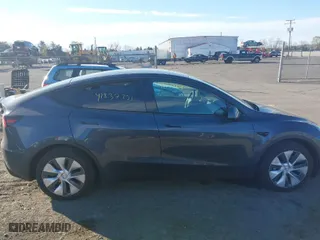 2023 Tesla Model Y Long Range with VIN 7SAYGDEE8PA140562, listed as a IAAI auction lot 41837231 with 30,847 mi miles. Bid and sale history available at carsss.com. Image 14.