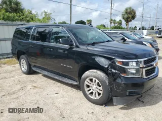 2019 Chevrolet Suburban LT with VIN 1GNSCHKC7KR178466, listed as a Copart auction lot 70145464 with 189,683 mi miles and Clean Title. Bid and sale history available at DreamBid. Image 4.