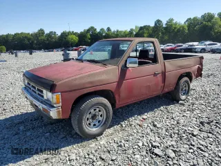 1991 Nissan Frontier XE with VIN 1N6SD11S2MC412375, listed as a Copart auction lot 61015515 with 201,629 mi miles and Salvage title. Bid and sale history available at DreamBid. Image 1.