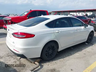 2020 Ford Fusion SE with VIN 3FA6P0HD3LR161093, listed as a IAAI auction lot 42127161 with 59,607 mi miles and . Bid and sale history available at DreamBid. Image 4.