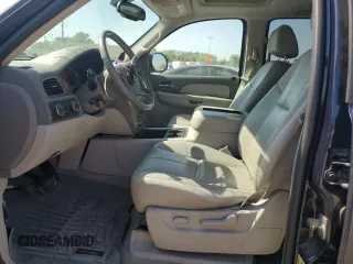 2007 GMC Yukon SLT with VIN 1GKFK13057J345796, listed as a Copart auction lot 71773124 with 218,788 mi miles and Salvage Title. Bid and sale history available at carsss.com. Image 7.