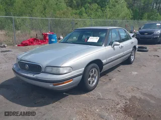 1998 Buick LeSabre Custom with VIN 1G4HP52K1WH412332, listed as a IAAI auction lot 41923320 with 201,306 mi miles. Bid and sale history available at carsss.com. Image 2.