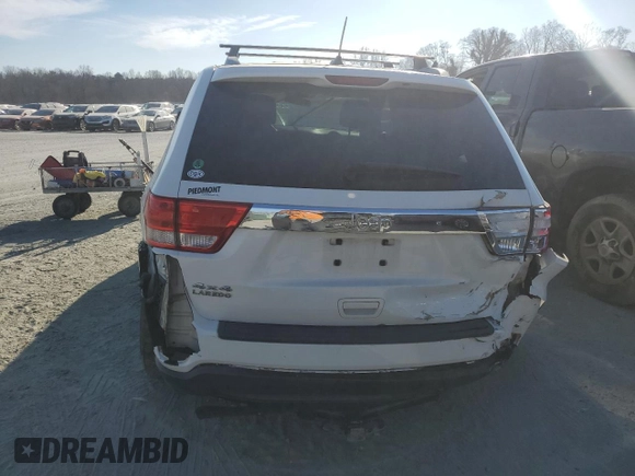 2012 Jeep Grand Cherokee Laredo with VIN 1C4RJFAG0CC201435, listed as a Copart auction lot 47026885 with 205,603 mi miles and Salvage Title. Bid and sale history available at carsss.com. Image 6.