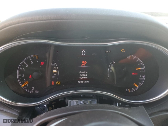 2017 Jeep Grand Cherokee Overland with VIN 1C4RJECG2HC712823, listed as a Copart auction lot 48063325 with 124,812 mi miles and Salvage Title. Bid and sale history available at carsss.com. Image 9.