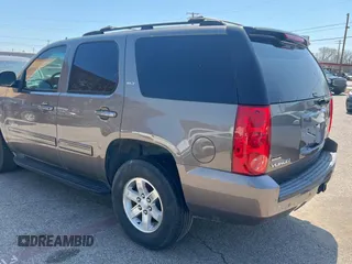 2012 GMC Yukon SLT with VIN 1GKS1CE05CR141571, listed as a Copart auction lot 49110005 with 116,634 mi miles and Clean Title. Bid and sale history available at carsss.com. Image 3.