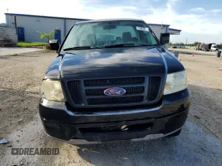 2007 Ford F-150 STX with VIN 1FTRF02297KD15057, listed as a Copart auction lot 73847974 with 184,413 mi miles and Salvage Title. Bid and sale history available at carsss.com. Image 5.