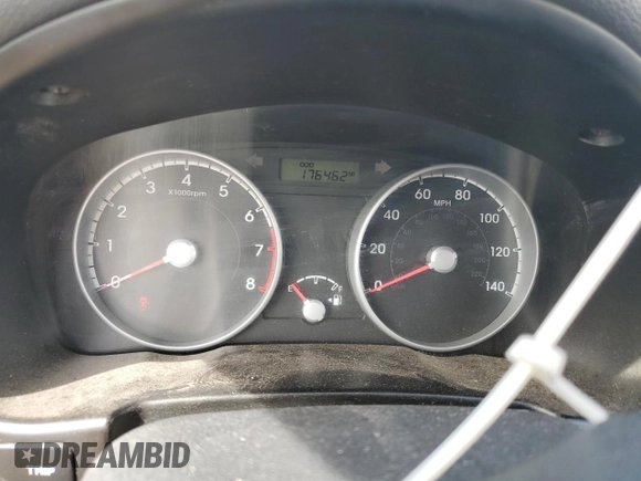 2010 Hyundai Accent GS z VIN KMHCM3AC7AU173953, wystawiony jako Copart lot #51433465 z przebiegiem 176 462 mil mil oraz Szkoda całkowita • Salvage title. Historia ofert i sprzedaży dostępna na DreamBid. Obrazek 9.