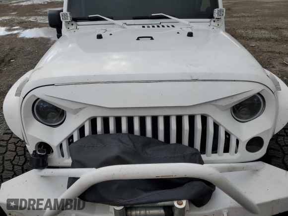 2013 Jeep Wrangler Sahara z VIN 1C4AJWBG7DL512437, wystawiony jako Copart lot #48928325 z przebiegiem Nie podano mil oraz Szkoda całkowita • Salvage title. Historia ofert i sprzedaży dostępna na DreamBid. Obrazek 12.