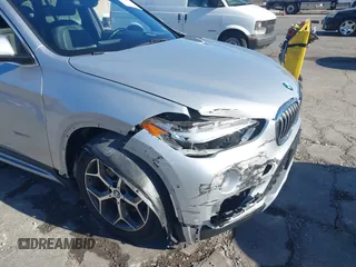 2017 BMW X1 xDrive28i z VIN WBXHT3Z34H4A53805, wystawiony jako IAAI lot #40682476 z przebiegiem 225 253 mil mil oraz . Historia ofert i sprzedaży dostępna na DreamBid. Obrazek 6.