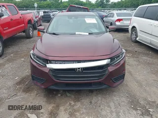2020 Honda Insight Touring z VIN 19XZE4F93LE010040, wystawiony jako IAAI lot #42240572 z przebiegiem 52 299 mil mil oraz . Historia ofert i sprzedaży dostępna na DreamBid. Obrazek 12.