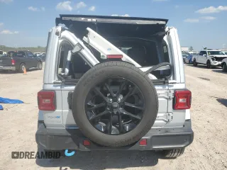 2024 Jeep Wrangler Sahara with VIN 1C4RJXP60RW122620, listed as a Copart auction lot 50622135 with 22,238 mi miles and Salvage Title. Bid and sale history available at DreamBid. Image 6.