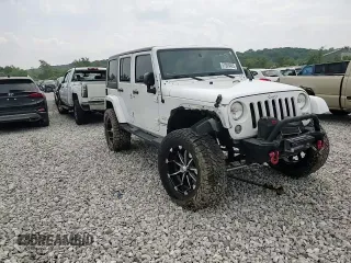 2014 Jeep Wrangler Unlimited Sahara with VIN 1C4BJWEG8EL266340, listed as a Copart auction lot 57809465 with 121,191 mi miles and Salvage title. Bid and sale history available at DreamBid. Image 15.