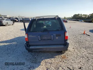 2002 Isuzu Rodeo S with VIN 4S2CK58W124307433, listed as a Copart auction lot 75447074 with 129,163 mi miles and Salvage title. Bid and sale history available at DreamBid. Image 6.