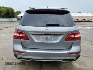 2012 Mercedes-Benz M 350 with VIN 4JGDA5HB2CA027986, listed as a Copart auction lot 71714874 with 165,916 mi miles and Salvage title. Bid and sale history available at DreamBid. Image 6.