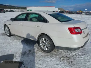 2011 Ford Taurus SEL z VIN 1FAHP2EW2BG143071, wystawiony jako IAAI lot #41538097 z przebiegiem 126 668 mil mil oraz . Historia ofert i sprzedaży dostępna na DreamBid. Obrazek 3.