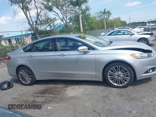2014 Ford Fusion SE with VIN 3FA6P0HD0ER133772, listed as a IAAI auction lot 41800268 with 135,518 mi miles. Bid and sale history available at carsss.com. Image 13.