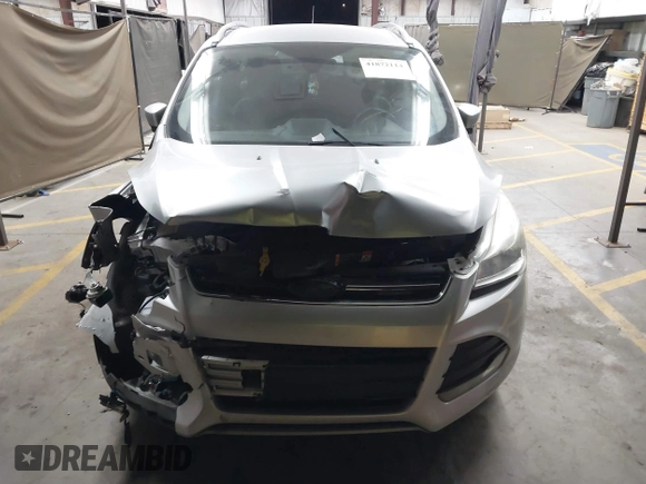 2015 Ford Escape Titanium with VIN 1FMCU0J96FUB81598, listed as a IAAI auction lot 41872114 with 122,001 mi miles and . Bid and sale history available at DreamBid. Image 12.