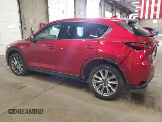 2020 Mazda CX-5 Grand Touring with VIN JM3KFBDM9L0760861, listed as a Copart auction lot 60977275 with 58,608 mi miles and Salvage title. Bid and sale history available at DreamBid. Image 2.
