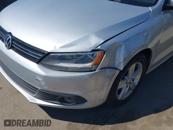 2012 Volkswagen Jetta TDI w/Premium with VIN 3VWLL7AJ8CM314305, listed as a IAAI auction lot 41885355 with 75,669 mi miles and . Bid and sale history available at DreamBid. Image 6.