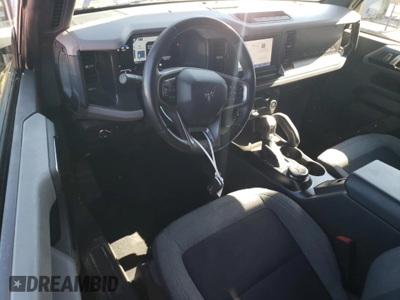 2021 Ford Bronco с VIN 1FMDE5CH0MLA60295, выставлен на аукционе Copart как лот 77109024 с пробегом 12 804 миль миль и Списание • Salvage title. История ставок и продаж доступна на DreamBid. Изображение 8.