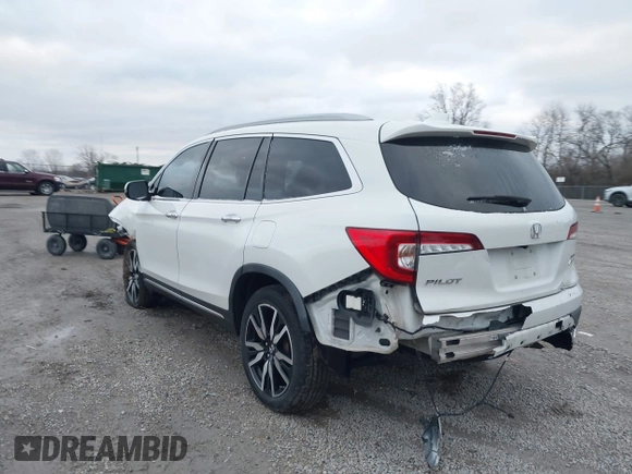 2020 Honda Pilot Touring 8-Passenger with VIN 5FNYF6H96LB056229, listed as a IAAI auction lot 41738249 with 65,099 mi miles and . Bid and sale history available at DreamBid. Image 3.