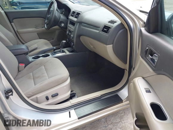 2012 Ford Fusion Hybrid с VIN 3FADP0L36CR426322, выставлен на аукционе IAAI как лот 42592635 с пробегом 151 941 миль миль и . История ставок и продаж доступна на DreamBid. Изображение 5.