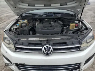 2012 Volkswagen Touareg Sport with VIN WVGEF9BP2CD010668, listed as a Copart auction lot 55306485 with 166,255 mi miles and Clean Title. Bid and sale history available at DreamBid. Image 12.