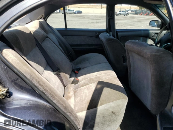 1999 Nissan Maxima GXE z VIN JN1CA21D9XM409448, wystawiony jako Copart lot #51822895 z przebiegiem Nie podano mil oraz Szkoda całkowita • Salvage title. Historia ofert i sprzedaży dostępna na DreamBid. Obrazek 11.