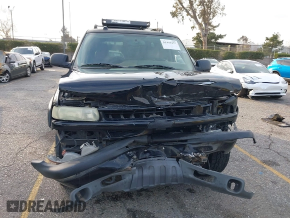 2004 Chevrolet Tahoe LS with VIN 1GNEK13T64R265302, listed as a IAAI auction lot 41445237 with 242,840 mi miles. Bid and sale history available at carsss.com. Image 12.