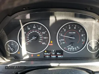 2015 BMW 4 Series 428i xDrive with VIN WBA4A7C58FD413734, listed as a Copart auction lot 50252325 with 74,629 mi miles and Salvage title. Bid and sale history available at DreamBid. Image 9.