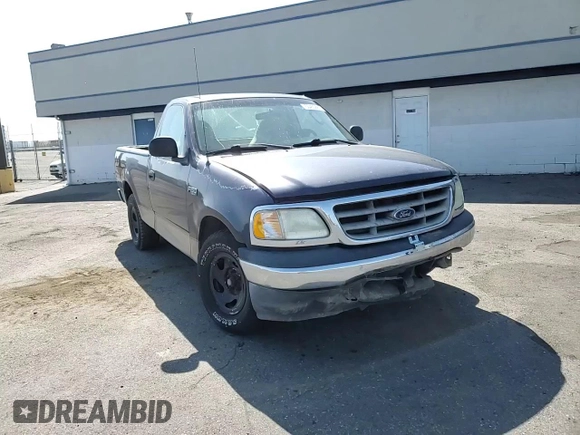 2003 Ford F-150 XL with VIN 1FTRF17293NA60031, listed as a Copart auction lot 55433885 with 186,557 mi miles and Salvage title. Bid and sale history available at DreamBid. Image 13.
