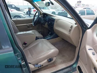1999 Ford Explorer XLT z VIN 1FMZU32E7XZA43211, wystawiony jako IAAI lot #42162142 z przebiegiem 200 469 mil mil oraz . Historia ofert i sprzedaży dostępna na DreamBid. Obrazek 5.