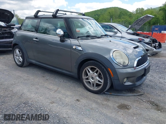 2009 MINI Hardtop S with VIN WMWMF73549TX41034, listed as a IAAI auction lot 42210662 with 108,118 mi miles and . Bid and sale history available at DreamBid. Image 1.