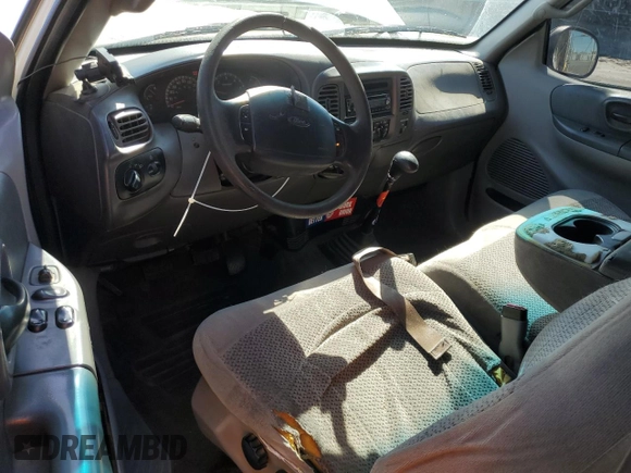 2000 Ford F-150 XL with VIN 1FTZX172XYNC01869, listed as a Copart auction lot 47414095 with 0 mi miles and Salvage Title. Bid and sale history available at carsss.com. Image 8.