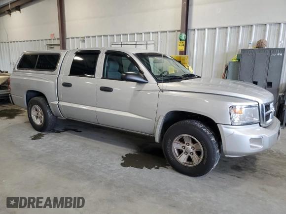 2008 Dodge Dakota SLT with VIN 1D7HE48N28S506012, listed as a Copart auction lot 63875014 with 121,562 mi miles and Salvage title. Bid and sale history available at DreamBid. Image 4.