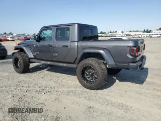 2022 Jeep Gladiator High Altitude with VIN 1C6HJTFG2NL114665, listed as a Copart auction lot 59818015 with 29,246 mi miles and Salvage title. Bid and sale history available at DreamBid. Image 2.