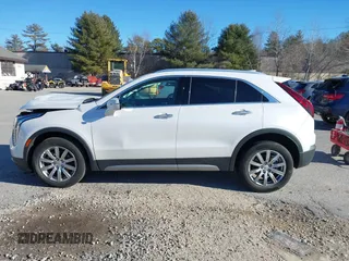 2022 Cadillac XT4 AWD Premium Luxury with VIN 1GYFZDR41NF105299, listed as a IAAI auction lot 41257154 with 34,904 mi miles and . Bid and sale history available at carsss.com. Image 14.