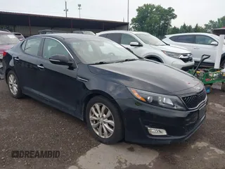 2014 Kia Optima LX with VIN 5XXGM4A7XEG333446, listed as a IAAI auction lot 42674636 with 145,867 mi miles and . Bid and sale history available at DreamBid. Image 1.