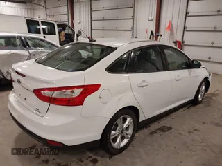 2014 Ford Focus SE with VIN 1FADP3F21EL200534, listed as a IAAI auction lot 41942026 with 61,414 mi miles. Bid and sale history available at carsss.com. Image 4.