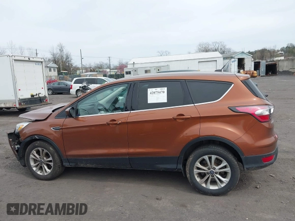 2017 Ford Escape SE with VIN 1FMCU9GD5HUA57132, listed as a IAAI auction lot 42075470 with 106,271 mi miles. Bid and sale history available at carsss.com. Image 14.