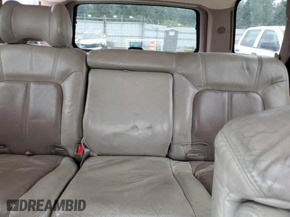 2002 GMC Yukon Denali z VIN 1GKEK63U82J224913, wystawiony jako Copart lot #60664885 z przebiegiem 208 794 mil mil oraz Szkoda całkowita • Salvage title. Historia ofert i sprzedaży dostępna na DreamBid. Obrazek 10.
