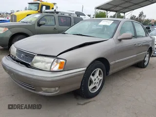 1998 Toyota Avalon XL with VIN 4T1BF18B5WU274472, listed as a IAAI auction lot 42188432 with 250,360 mi miles and . Bid and sale history available at DreamBid. Image 2.