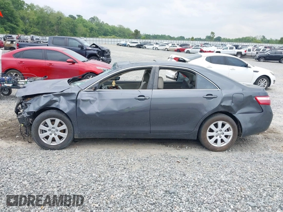2009 Toyota Camry LE z VIN 4T1BK46KX9U594987, wystawiony jako IAAI lot #42039029 z przebiegiem 156 812 mil mil oraz . Historia ofert i sprzedaży dostępna na DreamBid. Obrazek 15.