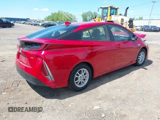 2021 Toyota Prius LE with VIN JTDKAMFP6M3192515, listed as a IAAI auction lot 42302003 with 74,247 mi miles and . Bid and sale history available at DreamBid. Image 4.