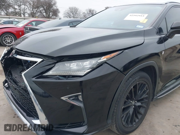 2018 Lexus RX with VIN 2T2BGMCA9JC023246, listed as a IAAI auction lot 41592915 with 91,444 mi miles. Bid and sale history available at carsss.com. Image 18.