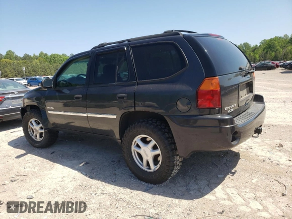 2006 GMC Envoy SLT with VIN 1GKDT13S062116733, listed as a Copart auction lot 54787325 with 172,281 mi miles and Salvage Title. Bid and sale history available at DreamBid. Image 2.