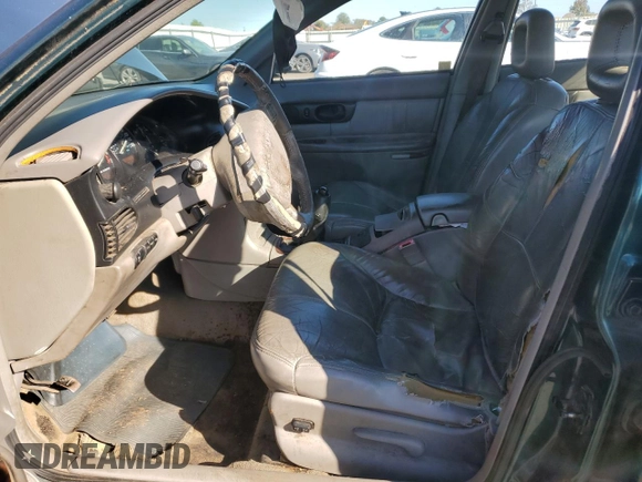 1999 Buick Regal GS with VIN 2G4WF5218X1591703, listed as a Copart auction lot 76690784 with 0 mi miles and Non Repairable. Bid and sale history available at carsss.com. Image 7.