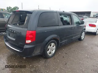 2013 Dodge Grand Caravan SE with VIN 2C4RDGBG8DR736291, listed as a IAAI auction lot 42161396 with Not Provided miles and . Bid and sale history available at DreamBid. Image 4.
