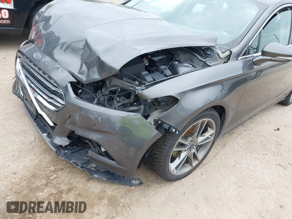 2016 Ford Fusion Titanium with VIN 3FA6P0D97GR133823, listed as a IAAI auction lot 42429708 with 166,105 mi miles and . Bid and sale history available at DreamBid. Image 18.